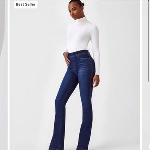 Spanx stretch flare jeans in midnight blue. Brand new never worn with tags.